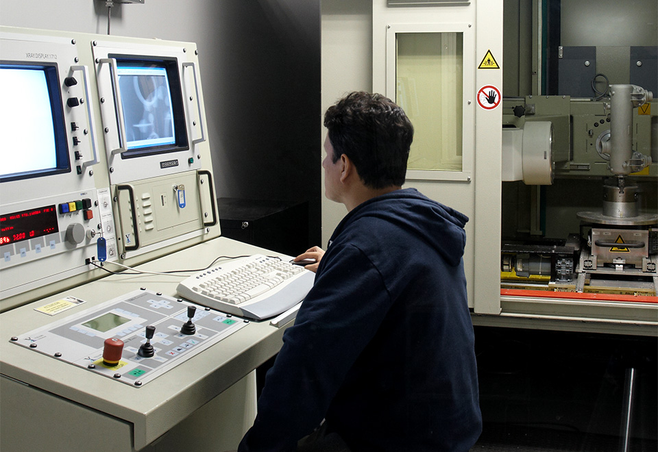 Worker using precise machinery